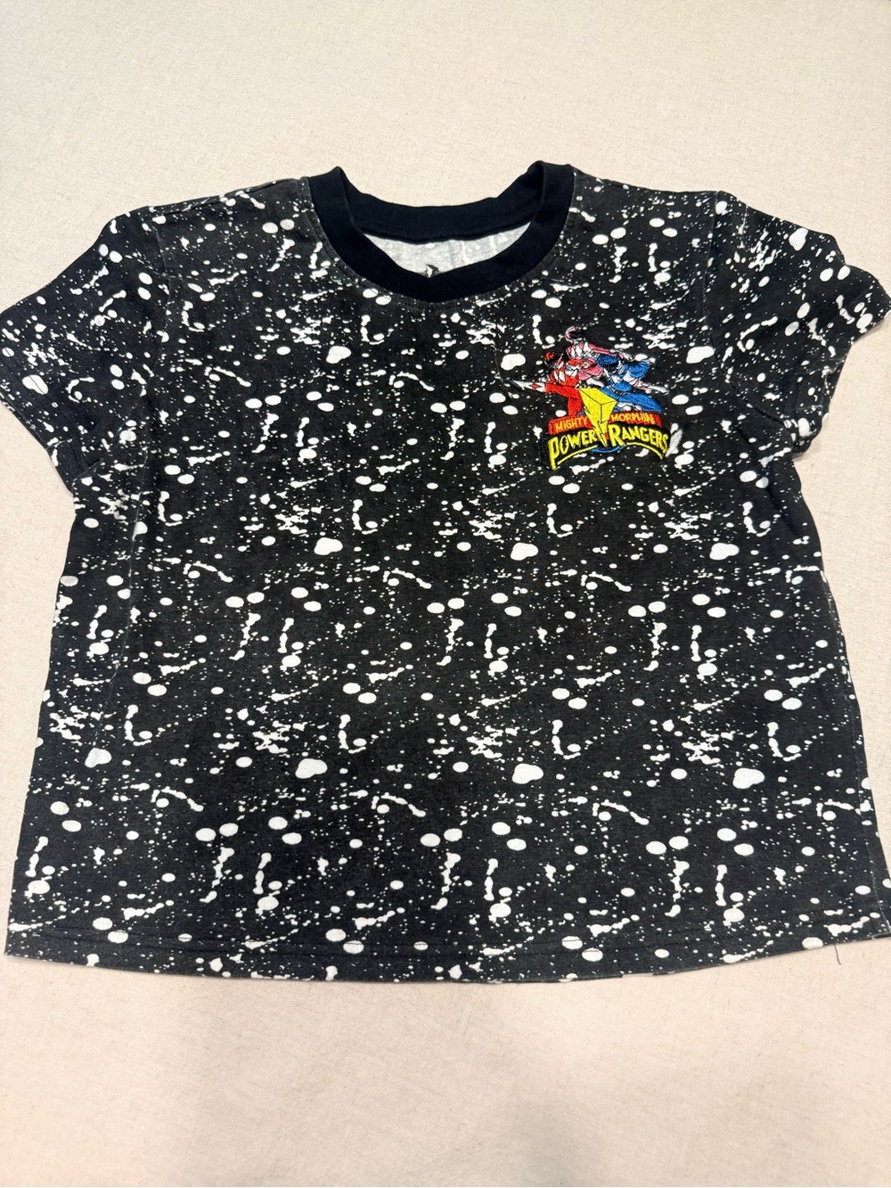 Power Ranger Black Tee with White Splatter and Multicolor Logo